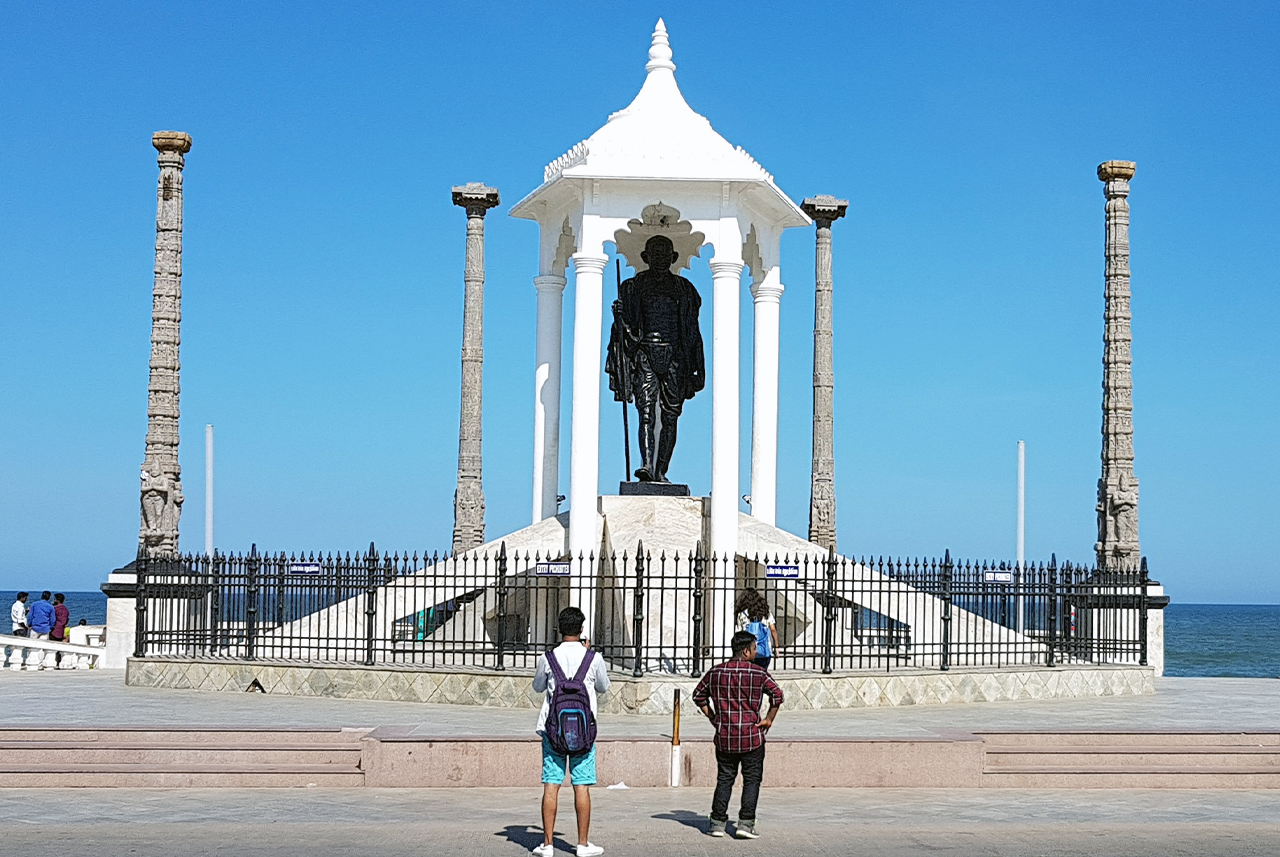 Mahatma Gandhi Statue Pondicherry with pillars near Promenade Beach